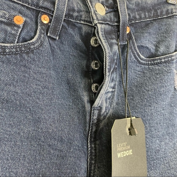 Levi’s Premium Wedgie Fit Icon High Rise Raw Hem Jeans in color Black and Blue - Picture 9 of 12